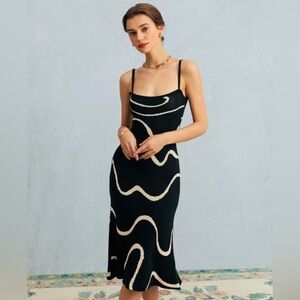 Black wave mermaid hem knit strappy dress